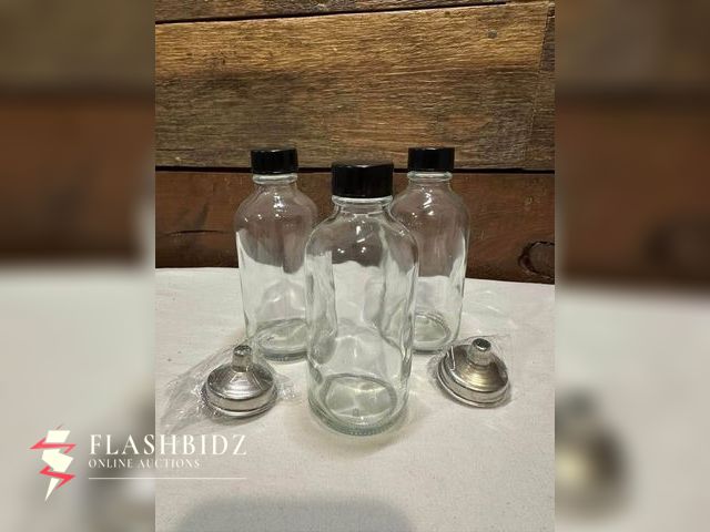 Lot 109-22-000225 - Set of 10 Clear Glass Bottles with Black Caps &amp; Mini Funnels – 8oz