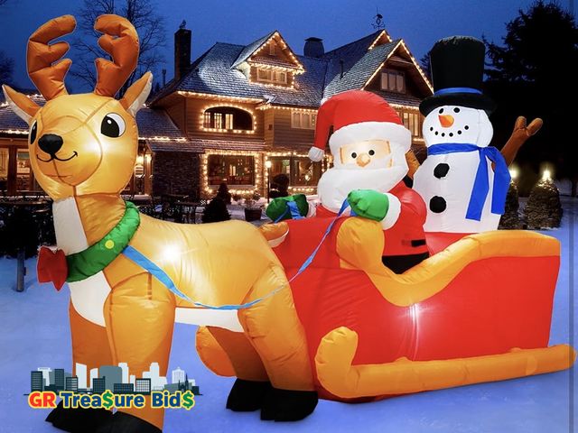 Lot 111-72727 - Danxilu 6.6 FT Long Christmas Inflatable Santa Claus on Sleigh with Snowman and Reindeer Outdoor Dec...