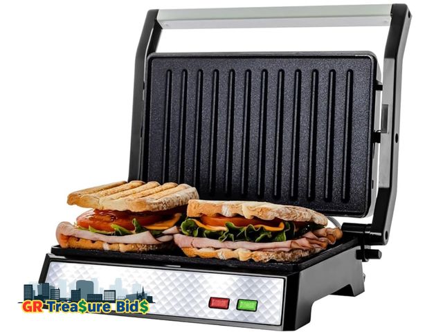 Lot 111-94679 - OVENTE Electric Indoor Panini Press Grill and Sandwich Maker with Non-Stick Coated Plates, Cool-Touc...