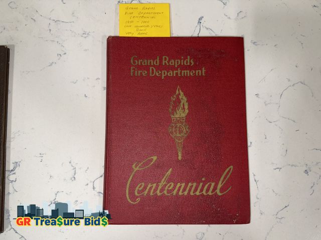 Lot 111-83557 - 1850-1950 Grand Rapids Fire Department Centennial Book  Photos and Advertising