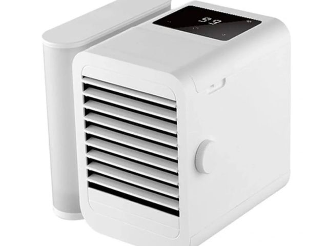 Lot 112-0210-23D - Snowman Lite Bright personal air cooler. New.