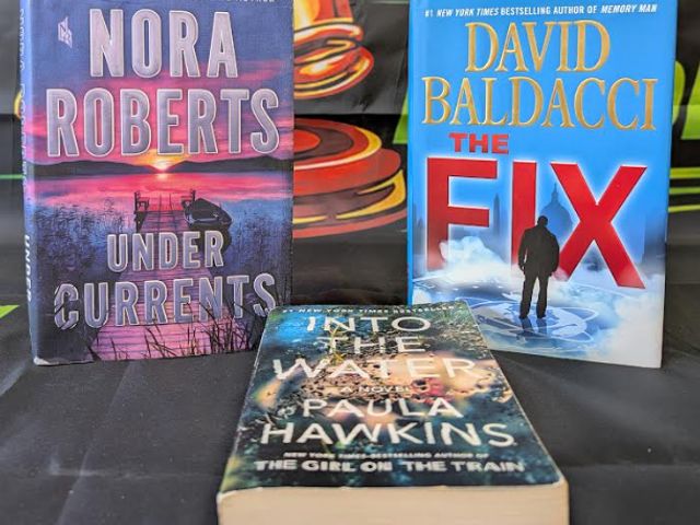 Lot 112-0297-23A - Lot of 2 used hard cover 1st edition books and one used paperback. Good condition. Titles included.....
