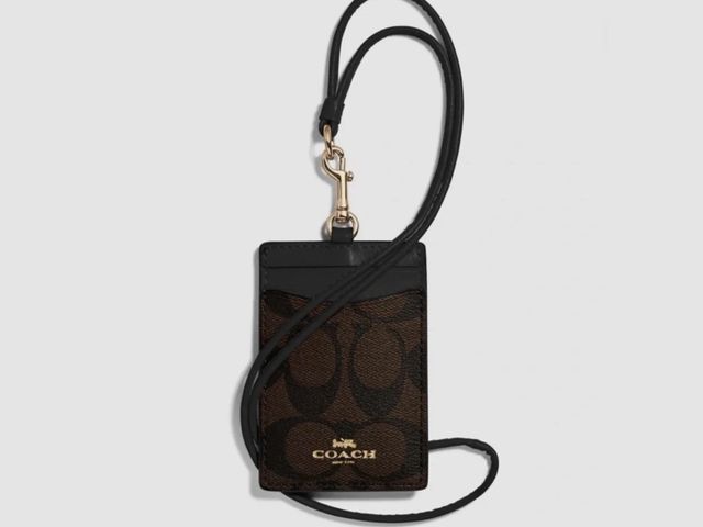 Lot 112-0288-22C - New. Coach identification holder.