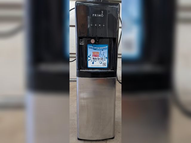 Lot 112-0511-garage - water cooler Primo Water Bottom Loading Pro Plus Hot and Cold Water Dispenser, Black/Silver. Used. V...