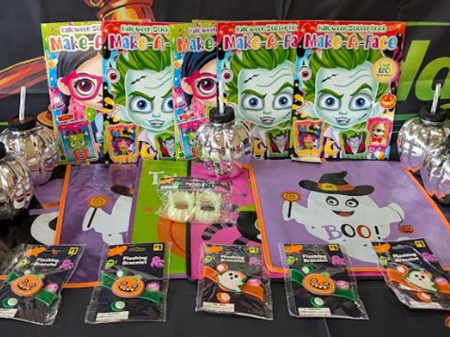 Lot 112-0529-23B-1 - Assorted Halloween lot. Includes (5) trick or treat bags, (5) Halloween sticker books, (5) flashing ...