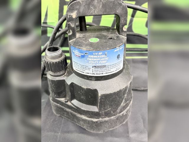 Lot 112-0104-21a - New Single Phase 1/4 sump pump new out of box.