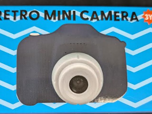 Lot 112-0262-22B - Retro mini Camera with USB cable for charging. Dark blue. New.