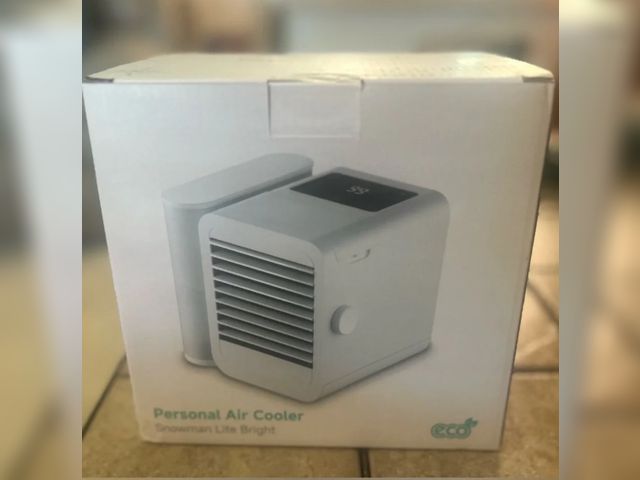 Lot 112-0205-23D - Snowman Lite Bright personal air cooler. New.