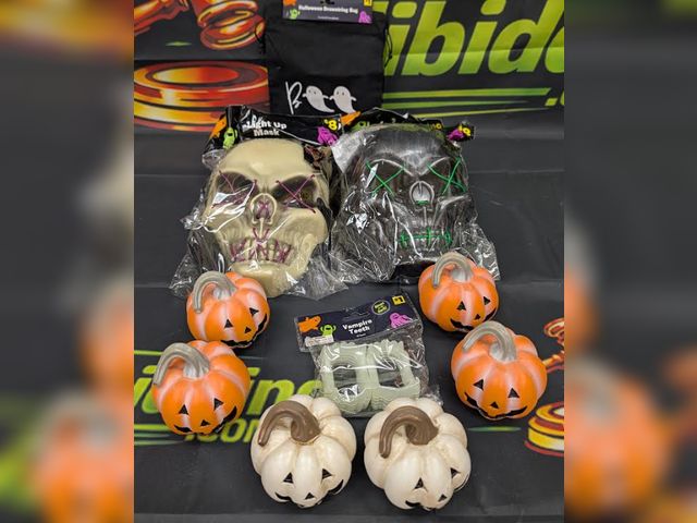 Lot 112-0574-32D-1 - Lot of assorted Halloween masks and decorations. All new.  Please see photo for reference.