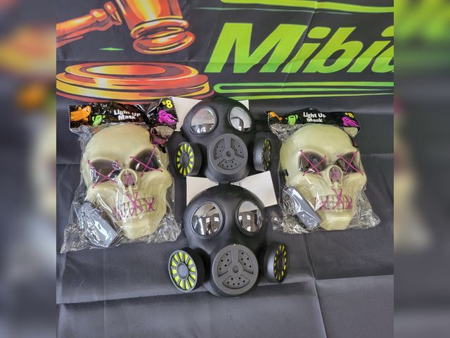 Lot 112-0535-23B-1 - Lot of 4. Halloween masks, includes two light up skull masks and two gas masks. New.