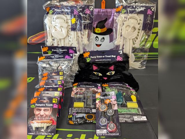 Lot 112-0525-23B-1 - Assorted Halloween lot. Includes (6) vampire teeth, (3) plastic hanging skeletons, (3) funny glasses...