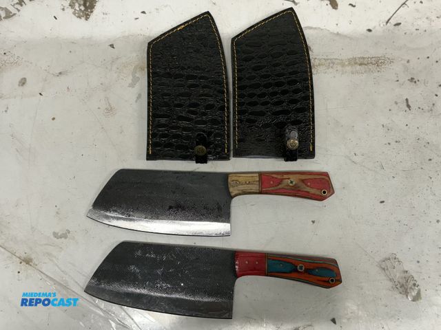 Lot 2-92626 - Lot of (2) Collectible 7” blade Kitchen Knives w/ Black Leather Sheathes
