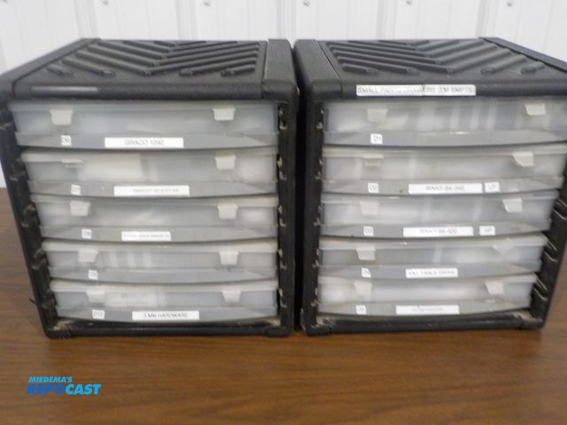 Lot 2-37898 - Lot of (2) Storage Units with new binks, devilbiss and graco replacement parts, stackable units