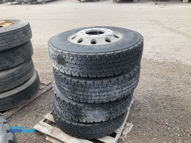 Lot 2-11832 - (4) recap 275/80R22.5 tires on aluminum wheels, used