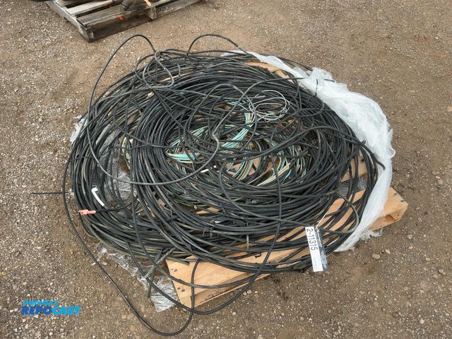 Lot 2-11315 - Skid of used wire, includes 2 and 3 AWG, green wire is smaller gauge, coating coming off