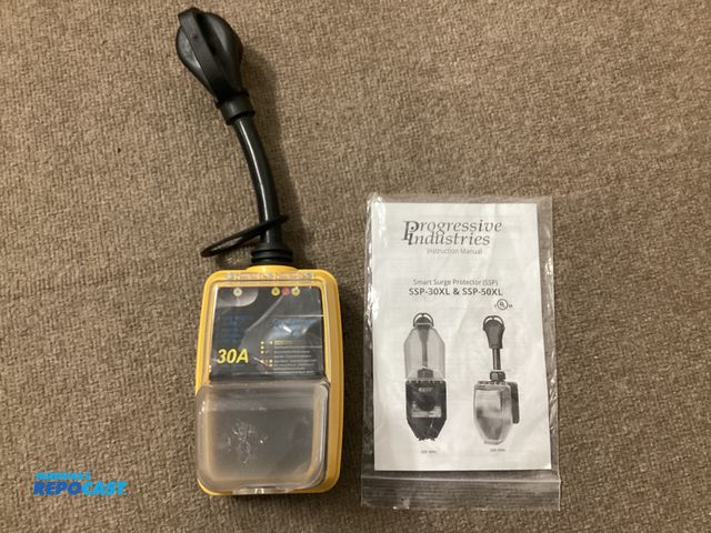 Lot 2-34398 - New 30 Amp Circuit Analyzer with Surge Protection. Helps protect your RV from power surges up to 210...