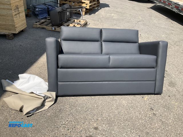 Lot 2-99127 - Blue RV Jack Knife Sofa measuring 59” x 32”