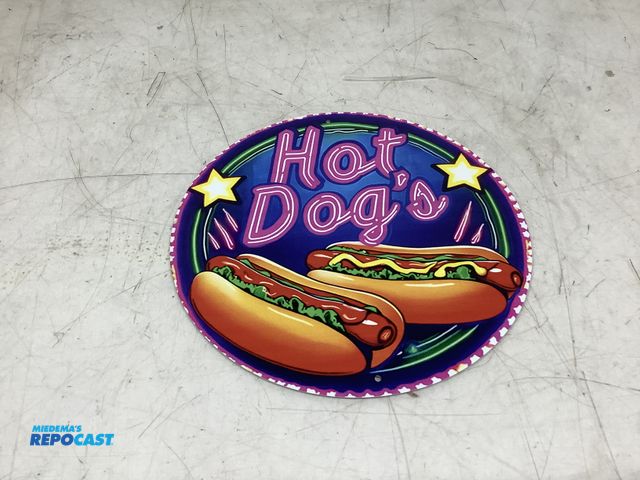 Lot 2-76344 - Hot dogs circular metal tin sign approx. 8”