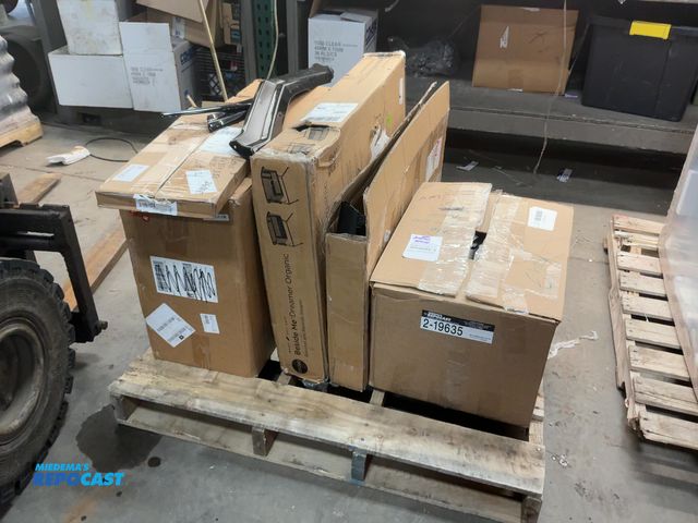 Lot 2-19635 - Skid lot of assorted Car Parts and New Bassinet