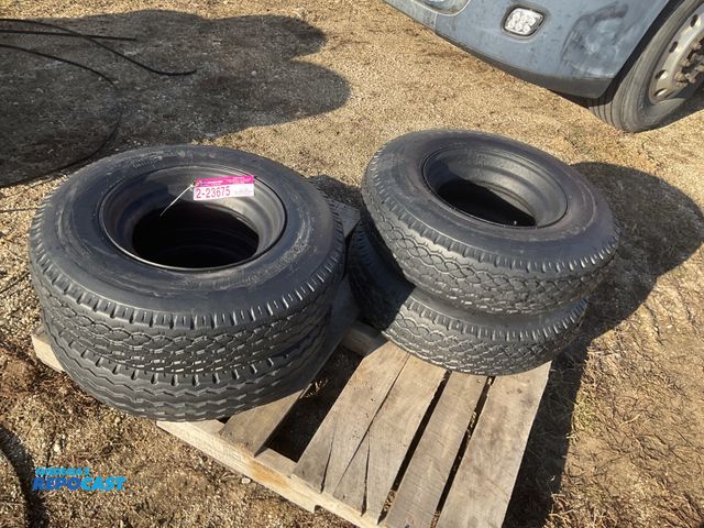 Lot 2-23675 - (4) 8-14.5 tires on steel mobile home style wheels, used