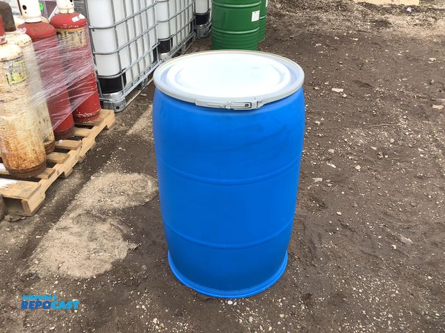 Lot 2-19309 - 1 55 gallon blue plastic barrels with removable lid and locking rings, clean inside, contained a foo...