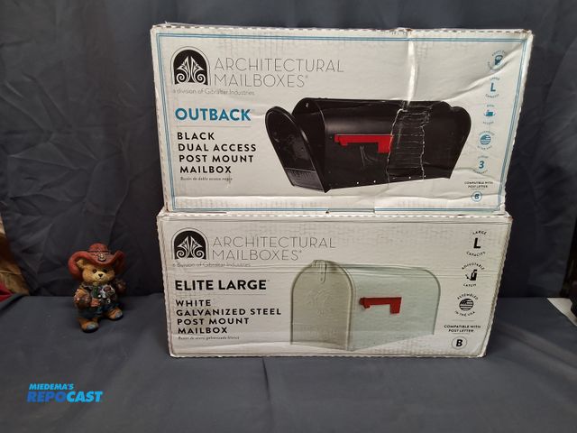Lot 2-27556 - (1) OUTBACK BLACK DUAL ACCESS POST MOUNT MAILBOX AND (1) ELITE LARGE WHITE GALVANIZED STEEL POST MOU...
