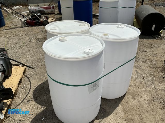 Lot 2-64034 - lot of 3 55 gallon white plastic barrels with 2 removable bungs, contained vinegar