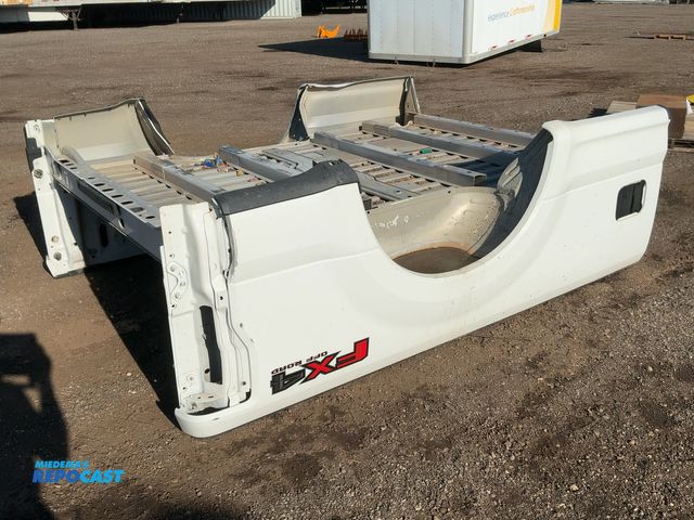 Lot 2-30101 - Used Ford Super Duty Aluminum 8' Pickup Truck Box, no tailgate, tail lights, or fuel door, has dents...