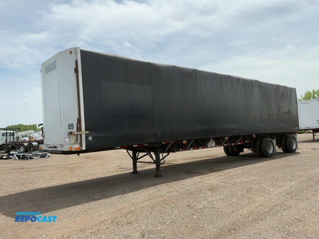Lot 2-11981 - 2005 Transcraft 48’ Flatbed Semi Trailer with Rolling Tarp System