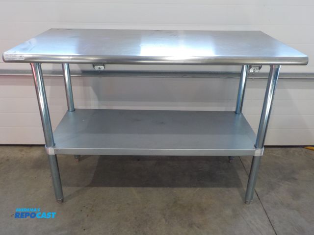 Lot 2-34109 - Commercial stainless steel table. Model 2KRE7A. 600 pound capacity. Bottom shelf. Adjustable feet. R...
