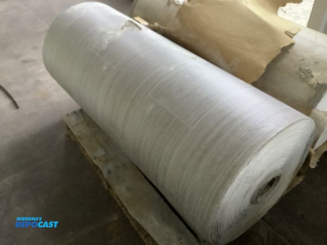 Lot 2-74463 - Tarkett flooring resembles tiles but in rolled sheet gray/brown stripy length unknown Some ripped an...