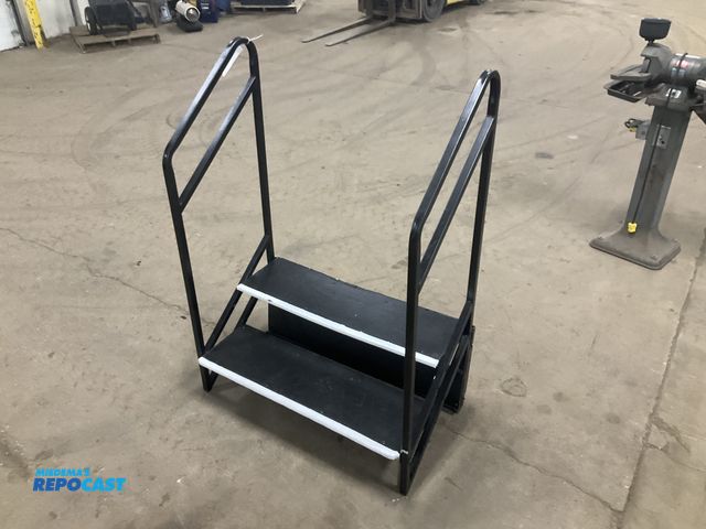 Lot 2-33348 - 2-step stair for a stage, 36”W treads, 15.5” tall at the top step, used, top tread is sagging in the...