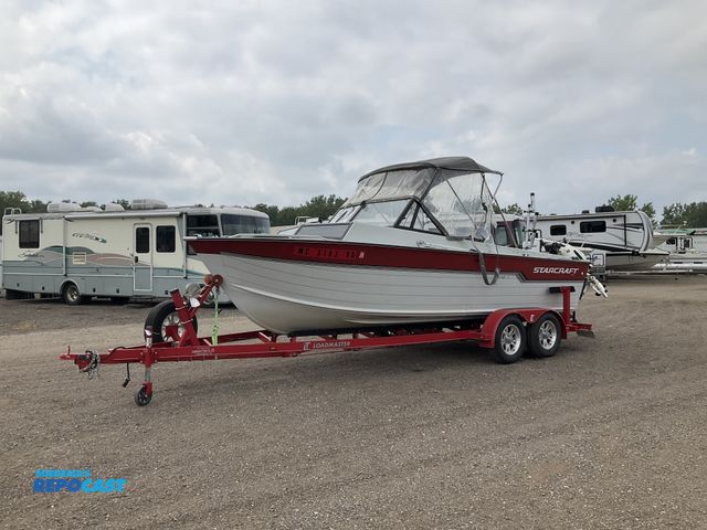 Lot 2-30185 - 1990 Starcraft Heritage 221 21ft Cuddy Cabin Boat