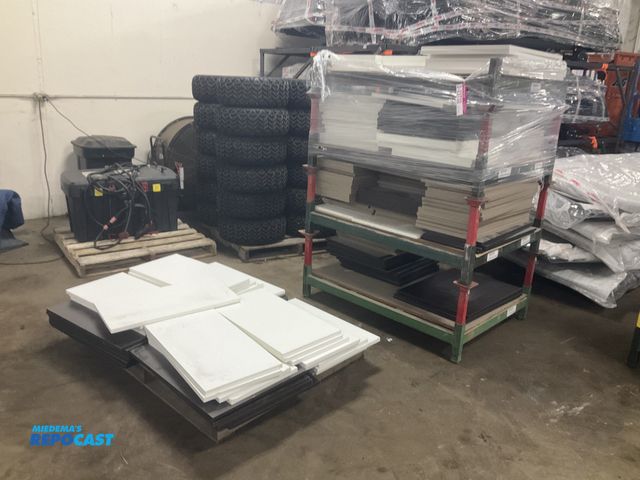 Lot 2-23732 - (4) metal stackable metal racks 35.5” x 48.5” with misc wood cabinet door panels