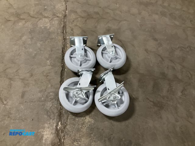 Lot 2-22008 - New Colson 8” x 2” casters, two swivel with brakes and two rigid, Performa rubber, 4” x 4.5” top pla...