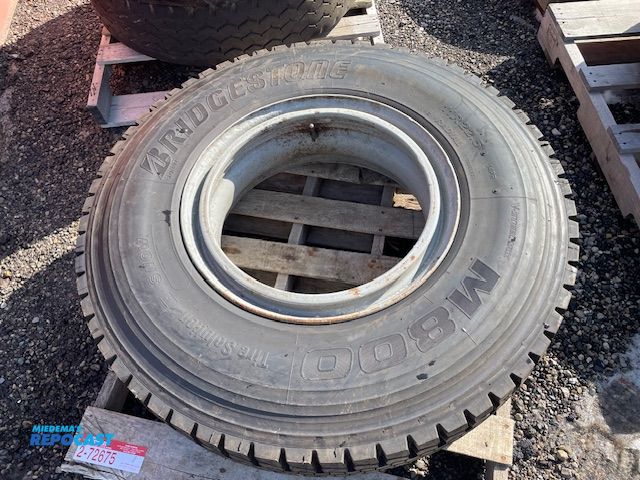 Lot 2-72675 - 1 Recapped Bridgestone 11 R 22.5 tire with rim.