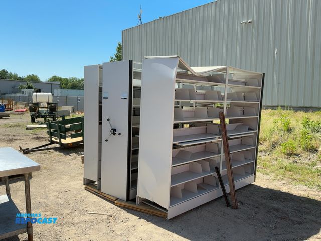 Lot 2-76759 - Space saver One unit is 6’10” x 2’ Metal Lot of (3) storage shelving units with space saver rolling ...