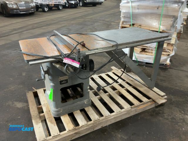 Lot 2-22797 - Delta Rockwell 10” Unisaw Table Saw, no blade, has fence (handle on fence broke and was unable to ge...