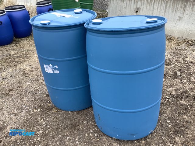 Lot 2-74438 - barrel (2) 55 gallon blue plastic barrels with removable bungs. contained molasses