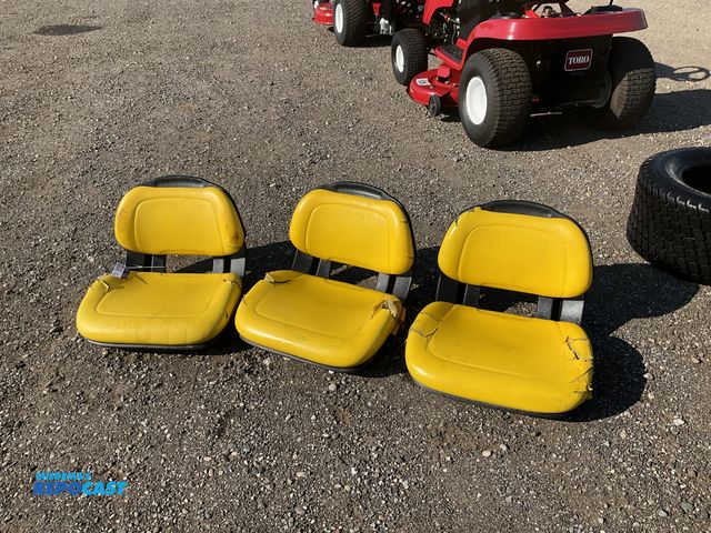 Lot 2-34346 - (3) John Deere seats, padded seat cushions and backrests, plastic frames, used, all have some rips i...