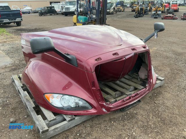 Lot 2-11768 - Used International Pro Star Hood, Has Headlights, No Grill, Comes with Front Bumper that is damaged,...