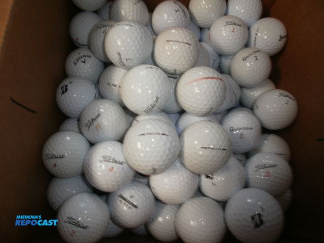 Lot 2-14748 - 100+ excellent golf balls includes prov1, prov1X, callaway, bridgestone, srixon, kirkland, taylor ma...