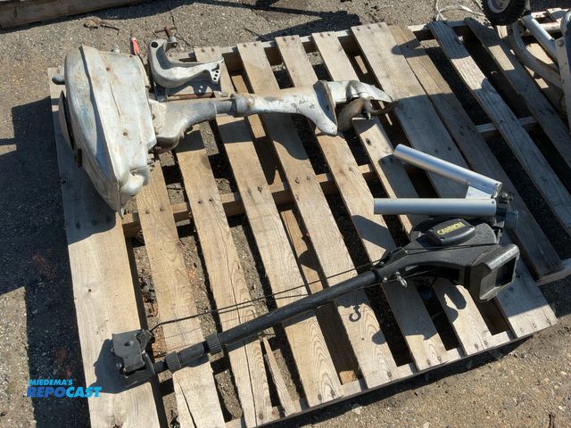 Lot 2-67859 - Blue Ribbon Champion Boat Motor and a Cannon Manual Downrigger