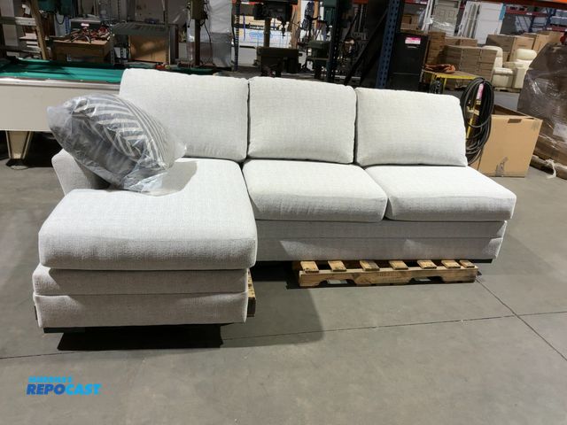 Lot 2-35787 - 2-Piece Sectional Sofa with Extra Pillows- 101”x62”