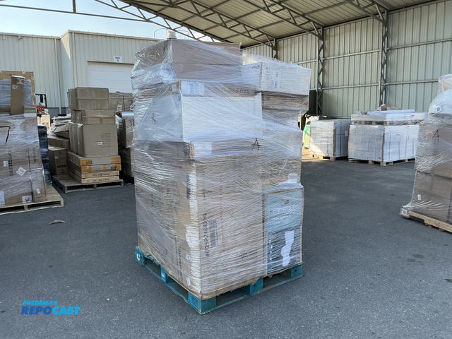 Lot 2-75654 - Skid of assorted bathroom furniture, including: toilets, medicine cabinets, a urinal, vanities, bath...