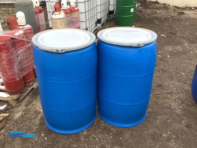Lot 2-19310 - 2 55 gallon blue plastic barrels with removable lid and locking rings, clean inside, contained a foo...