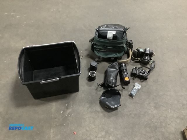 Lot 2-18400 - Lot of miscellaneous Cameras and supplies Includes Nikon N70 AF aspherical camera, canon T50camera, ...