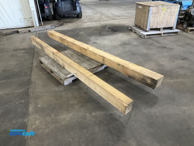 Lot 2-21014 - (2) rough sawn pine wood beams, one is approx 4-1/4” x 6” x 10’ 8”L and the other is approx 6” x 6” ...