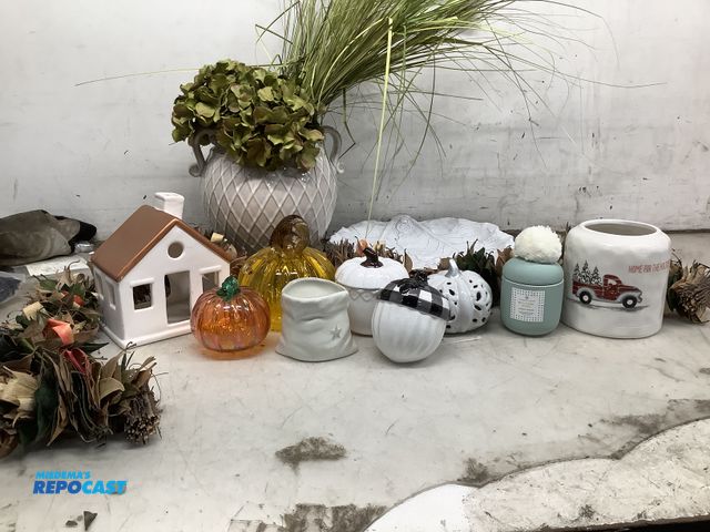 Lot 2-63325 - Assortment of seasonal fall decor and dishes glass pumpkin jars a candle leaf and pine cone garland ...