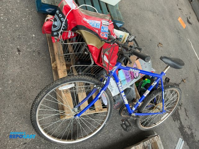 Lot 2-18247 - Skid lot of miscellaneous items including trail blazer bicycle, skateboard, speakers, inflatable tub...
